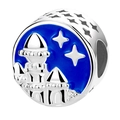 Macro shot of silver charm with blue enamel night sky and detailed castle engraving - Night Sky Castle Charm