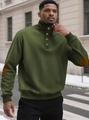 Detail of olive green waffle knit pullover featuring brown elbow patches and buttoned collar - S / Tops / Army Green