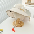 Detail of beige sun hat with rabbit ears, bow decoration and built-in safety whistle - 52-54cm (3-8 Years) / Beige