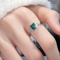 Elegant emerald cut green zircon ring with sparkling side stones in silver open band design - Rectangular Green Gem / Silver Emerald Cut Green Gemstone