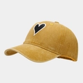 Detail of vintage washed mustard cotton baseball cap featuring a heart embroidery patch - Adjustable / Yellow