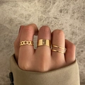Three-piece set of golden hip-hop chain and wide-surface rings on a model's hand - Gold Chain Wide And Thin Rings