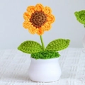 Handmade knitted sunflower in a white ceramic pot with detailed green yarn leaves - Sunflower Small Size