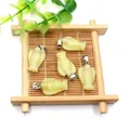 Set of five light green natural gemstone angel pendants with silver metal clasps - Xiu Jade