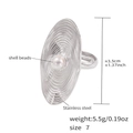 Detailed macro view of geometric shell pearl ring with concentric circular textured finish - Silver / Size 7 (Adjustable)
