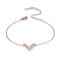 Macro shot of 18k rose gold V-shaped charm bracelet with K14 hallmark engraving - Rose Gold