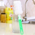 Long-handle bottle brush with white sponge head and green handle inside a glass - Individual Bag / L Green