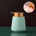 Nordic light green matte ceramic soap dispenser with elegant gold pump head - Rounded / Mint Green with Gold Pump