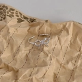 Silver S925 sterling silver bow ring with hollow twist design and adjustable open band - Adjustable Open / Platinum/Glossy