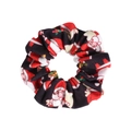 Detail of Christmas scrunchie featuring Santa Claus and holiday gift box patterns - Black