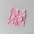 Flach liegende nahtlose rosa Yoga-Shorts mit hohem Bund und weißem Kontrastrand - S / Bubble Rosa