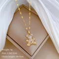 Detailed specs for gold bear necklace with cubic zirconia heart and size measurements - White Heart Bear