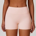 Pantaloncini da yoga rosa pesca a vita alta con vestibilità senza cuciture e tessuto elastico - rosa pesca