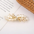 Detail of gold leaf bow hair clip with opal stone and delicate pearl embellishments - Style 2 Large Pearl Bowknot