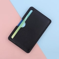 Slim black leather card holder with white stitching detail on a pink and blue background - Black