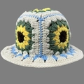Handmade crochet bucket hat featuring sunflower patterns and ivory wool knit texture - One Size / Beige Sunflower Hat