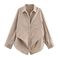 Detail of tan striped long sleeve shirt featuring a unique asymmetric wrap hem and lapel - XS / Khaki Stripe