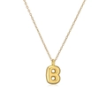 Close-up of gold-plated letter B pendant on a delicate cable chain necklace - Letter B