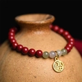 Red and light green beaded bracelet with a golden Fu pendant on a ceramic pot - Full Fortune Luck-cinnabar Bracelet #sz508