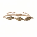 Detail of bohemian shell bracelet with adjustable beige cord and natural conch elements - Spotted Khaki