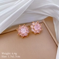 Macro shot of pink floral stud earrings with gold plating on a silk background - Pink Flower Stud Earrings (G237)
