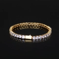 Lujosa pulsera de tenis dorada con circonitas blancas sobre una superficie negra reflectante - 5mm - 9 Pulgadas (22.86cm) / Dorado
