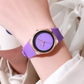 Stylish purple silicone strap watch for women with golden case and calendar display feature - Purple