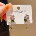 Silver S925 rose earrings featuring green crystal leaves and sparkling zircon accents - 925 Sterling Silver Earring Post - Silver Rose with Green Leaves