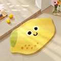 Lemon shaped yellow bath mat with cute smiling face and soft plush texture - Lemon Scent