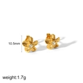 Macro shot of gold flower stud earrings featuring clear crystal centers and size labels - Gold Camellia Flower Stud Earrings(TE6794)