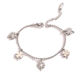 Detailed view of silver clover bracelet with sparkling zircon and beaded chain - Stainless Steel / Silver