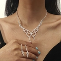 Elegant butterfly pendant necklace and drop earrings set with silver rhinestone finish - Hollow Butterfly Tassel Set (DTN14026774S)