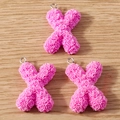 Detail of pink resin letter X charms with 3D rose relief and silver hanging loops - Letter X / 10 Pieces Pack / Pink