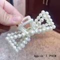 Elegant cream white pearl bow hair claw clip measuring 7.7x4cm for women styling - Bowtie Pearl