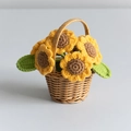 Handmade crocheted sunflower in a brown woven mini basket, vibrant yellow knitted petals - Mini Basket-Sunflower-Original