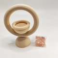 Close-up of natural wood essential oil diffuser stand with pink Himalayan salt stones - Himalayan Salt
