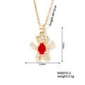 Detail view of gold bear pendant with red gemstone and dimensions 1.9cm by 1.6cm - Red Stone Bear (N00970-5)