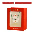 Grand sac cadeau de Noël rouge avec fenêtre en PVC et illustration festive du Père Noël - Grand / Rouge