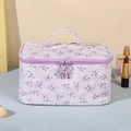 Floral textured makeup bag in light purple with star-shaped zippers and handle - Medium / Purple