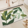 Non-slip white bathroom mat with green leaf pattern and tufted plush texture - 40*60cm / Dancing Green Leaves