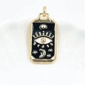 Detail of tarot pendant featuring a golden eye, crescent moon, and stars on black enamel - Black Evil Eye Pendant / Pendant Only
