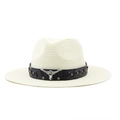 Detail of western straw hat featuring a metal longhorn skull and black leather band - Creamy White