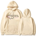 Beige hoodie featuring Jingle Some of the Way text with colorful bulb print in a flat layout - S / Khaki