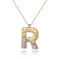 Detailed shot of two-tone letter R pendant with textured gold and smooth silver finish - Letter R