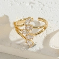 Three-band golden open ring with five diagonal oval zircons on white stone base - Oval White (JZ0238)