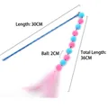 Blue and pink feather cat wand toy with 30cm handle and plush balls on a white background - Blue Pink Pom Pom