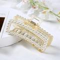 Detailed close-up of a clear pearl-encrusted hair claw clip with floral background decor - S217-11# Rectangular Transparent Pearl Clip