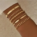 Bohemian gold layered bracelet set featuring Figaro and snake chain textures on wrist - SL212 Gold