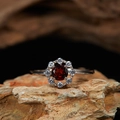 Macro shot of 925 silver garnet ring with red center stone and brilliant sparkle - Natural Garnet Minimalist Ring LR351