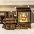 Vintage Bronze Weihnachtszug Schneekugel mit Weihnachtsmann und Goldglitzer - Weihnachtsmann bei Straßenlaterne